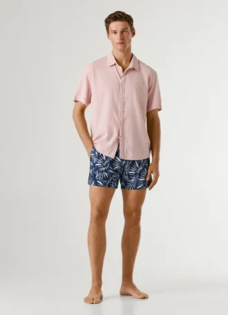 Badshorts med bladmönster
