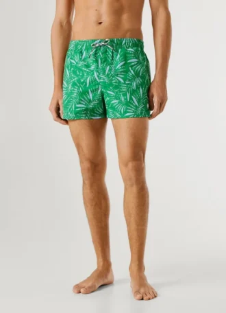 Badshorts med bladmönster