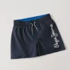 Badshorts med tryckt logotyp Badshorts med tryckt logotyp