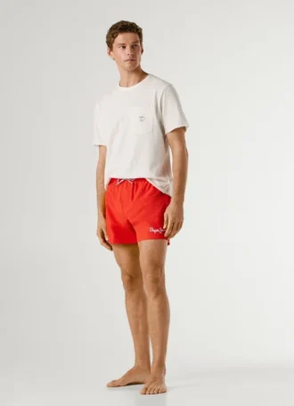 Badshorts med tryckt logotyp
