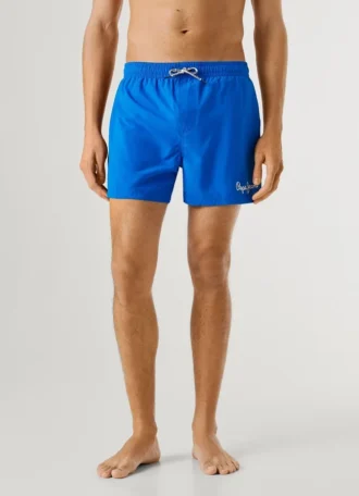 Badshorts med tryckt logotyp