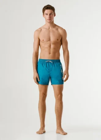 Badshorts med tryckt logotyp