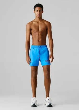 Badshorts med tryckt logotyp