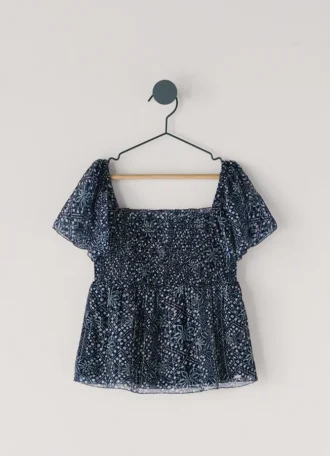 Blus med blommönster