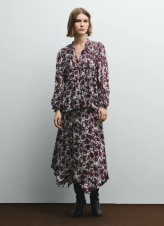 Blus med blommönster