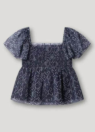 Blus med blommönster