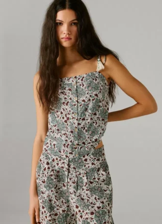 Blus med blommönster och spaghettiband