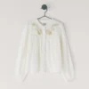 Blus med broderade detaljer Blus med broderade detaljer
