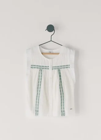 Blus med broderade detaljer