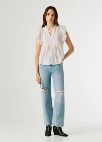 Blus med fjärilsärmar