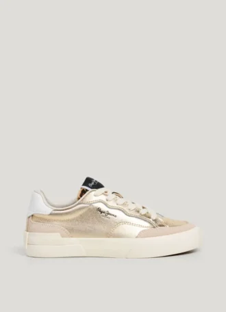 Guldfärgade sneakers med djurmönster
