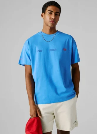 T-shirt med tryck på ryggen och lös passform