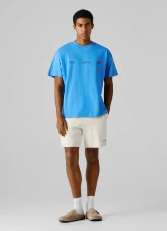T-shirt med tryck på ryggen och lös passform