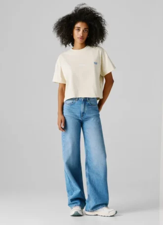 T-shirt med tryck på ryggen och lös passform